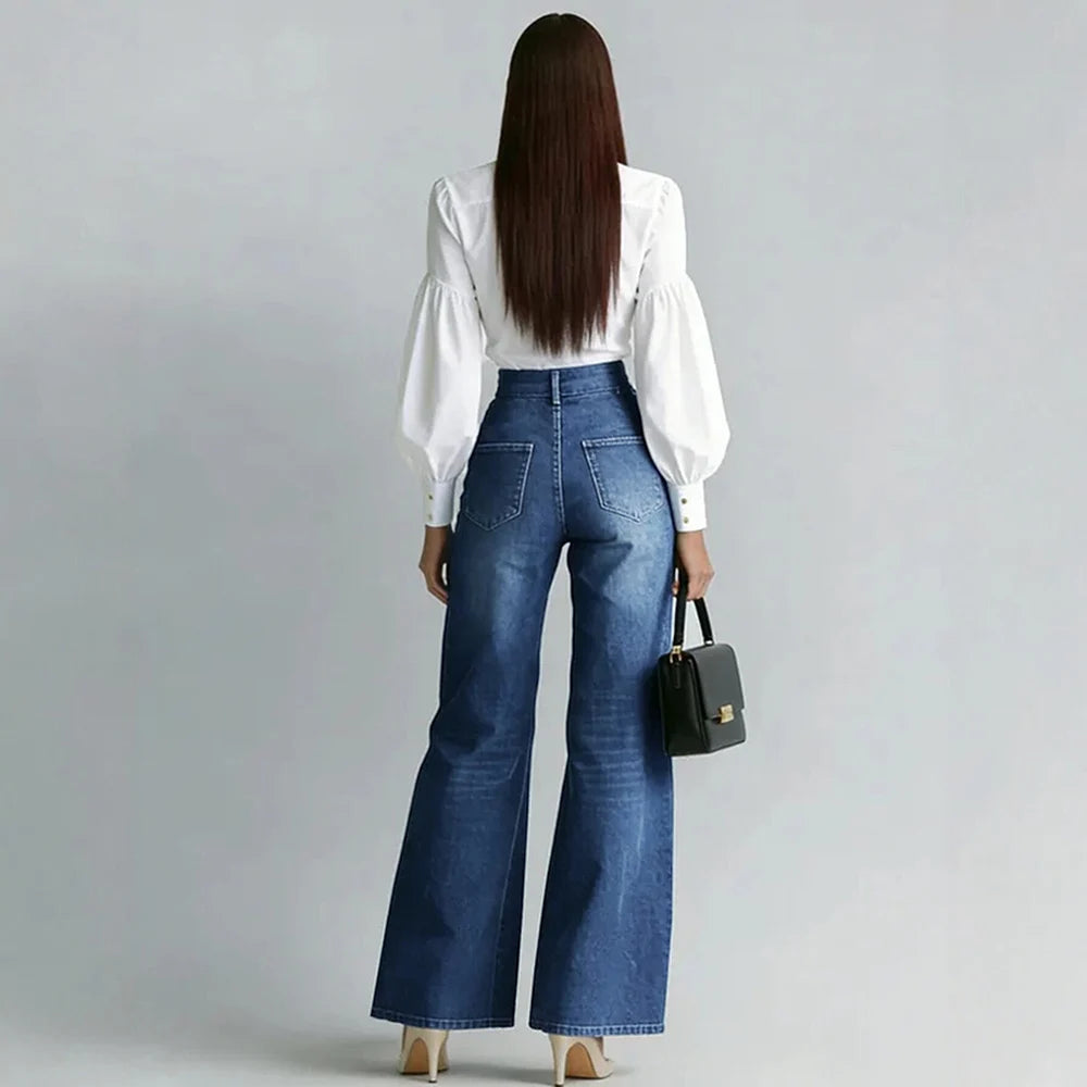 Jean taille haute bleu à zips dorés