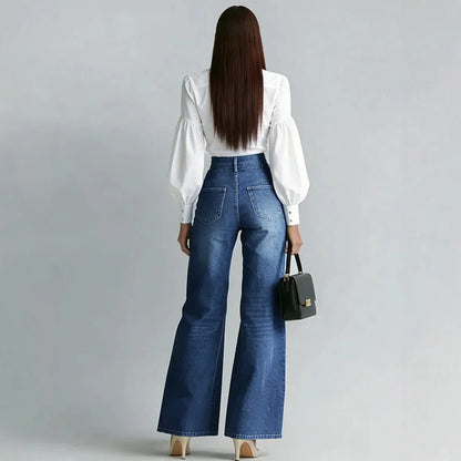 Jean taille haute bleu à zips dorés