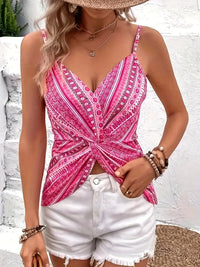 Camisole imprimée rose, bretelles fines, nœud devant, décolleté en V.