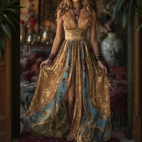 Robe maxi florale dorée, motifs bleus, buste doré, fente