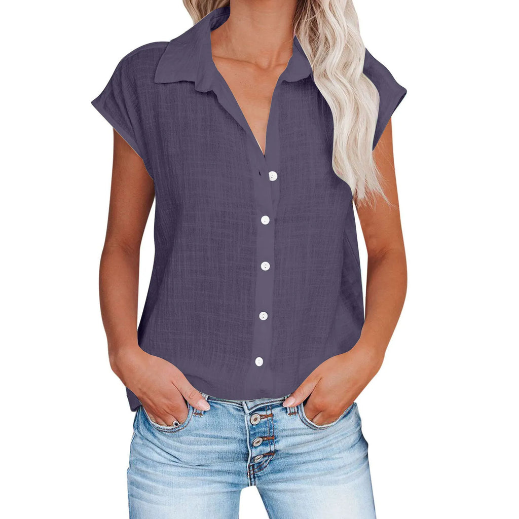 Chemisier femme bleu foncé en coton lin, col chemise, manches courtes, patte boutonnée.