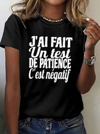 T-shirt noir femme à col rond, imprimé texte humoristique blanc, coupe décontractée