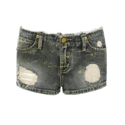 Short en denim bleu vintage pour femme, fermeture boutonnée, déchirures et ourlet effiloché.