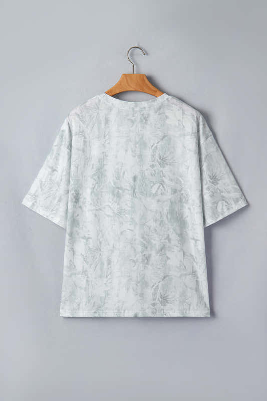 T-shirt gris clair à manches courtes, dos avec motif discret