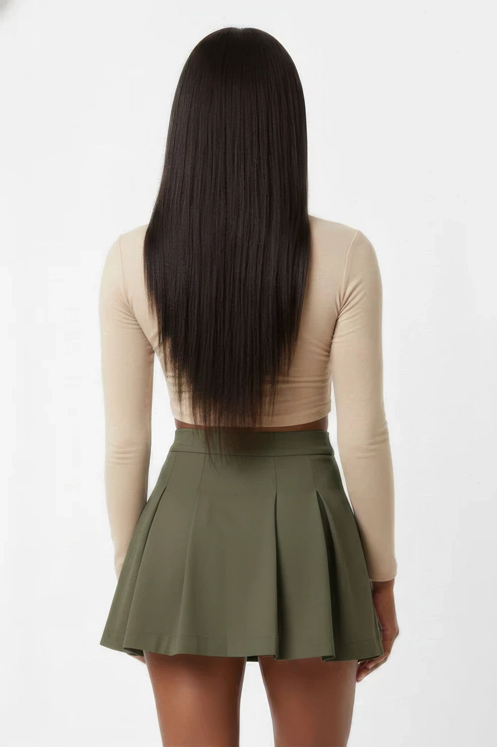 Jupe plissée taille haute vert militaire, vue arrière, plis marqués et évasement.