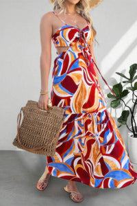 Robe longue sans manches froncée à nœud, motif abstrait rouge, bleu et jaune