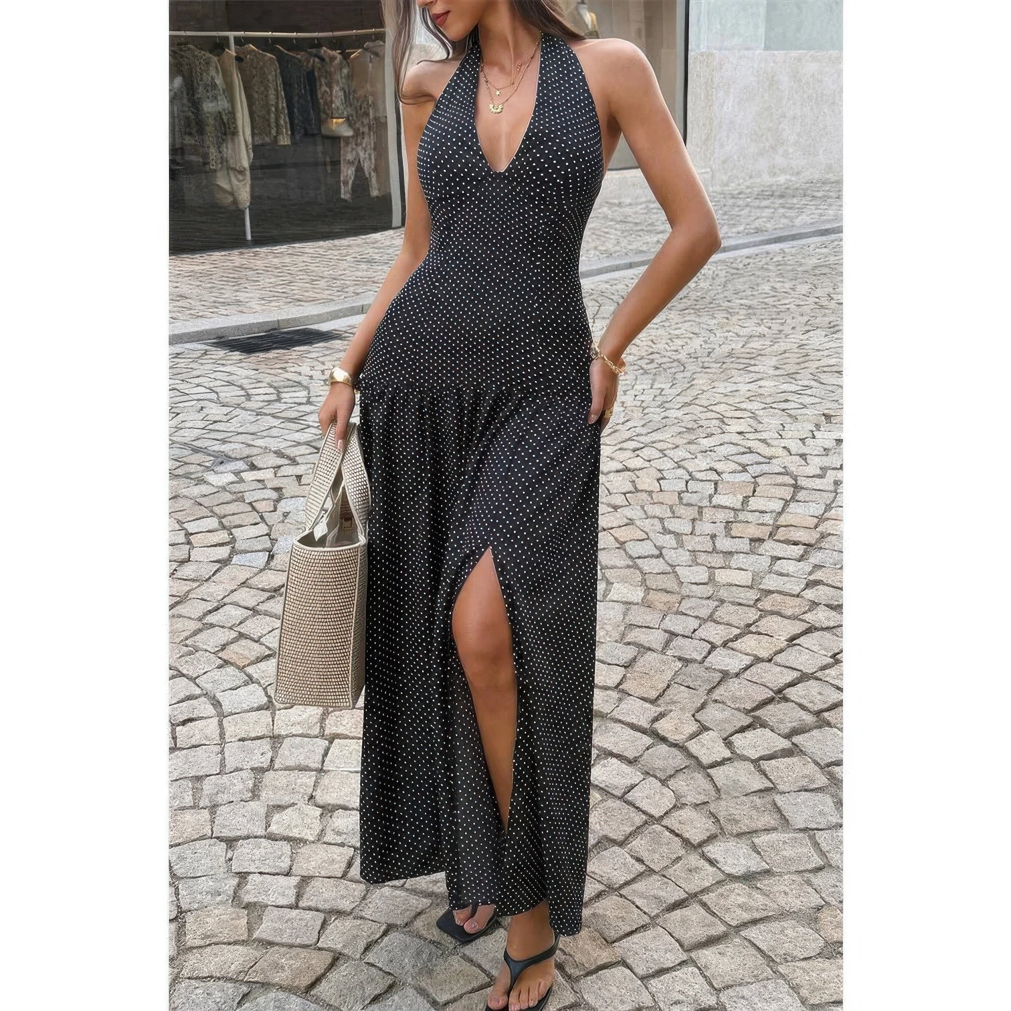 Robe longue noire à pois, col V halter, fente sur le devant