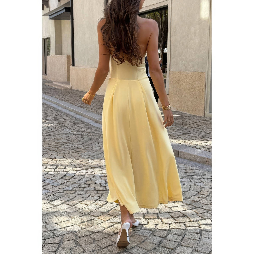 Robe midi jaune à col halter, dos nageur et jupe évasée