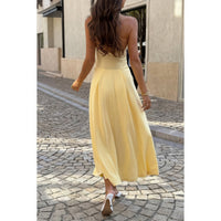 Robe midi jaune à col halter, dos nageur et jupe évasée