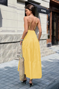Robe maxi jaune à dos nu, bretelles fines, taille haute, jupe évasée à volants