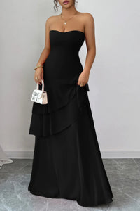 Robe longue noire à épaules dénudées, dos croisé, jupe maxi à volants