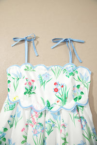 Robe à bretelles nouées, buste froncé, imprimé floral vert rouge bleu sur fond clair