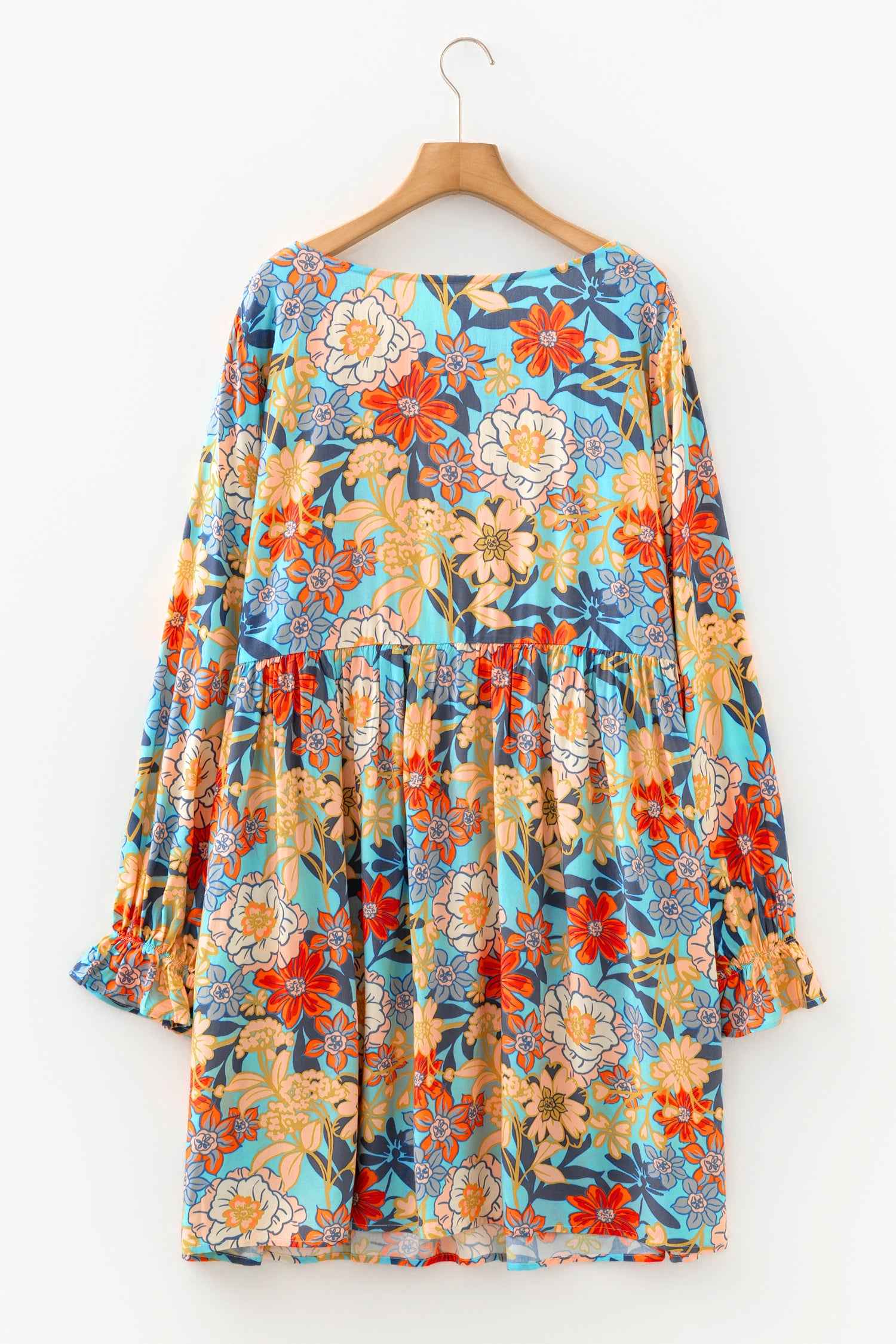 Robe mini bleue imprimé floral, manches longues à volants, volant à la taille