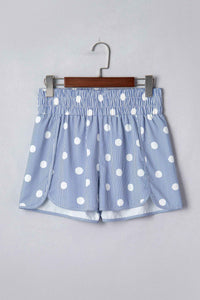 Short taille haute bleu à pois blancs, ceinture élastique froncée, devant en V