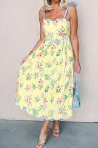 Robe midi jaune clair à fleurs, bretelles à nouer, taille froncée