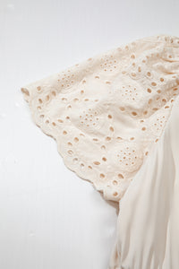 Manche de robe maxi en dentelle ajourée, empiècement rapporté sur tissu clair