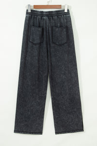 Pantalon large noir délavé minéral, taille élastique à cordon, deux poches plaquées devant