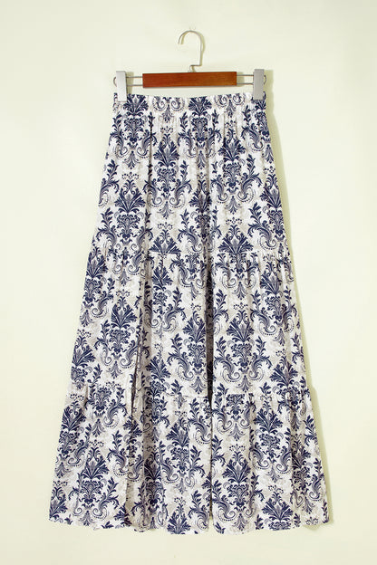 Jupe longue bohème bleu et blanc à imprimé floral, évasée.