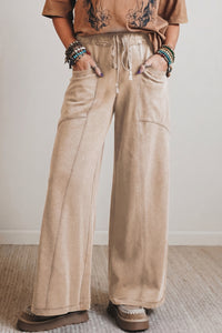 Pantalon taille haute ample beige, à cordon, poches latérales et coutures