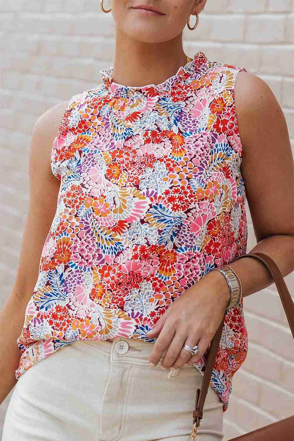 Débardeur femme sans manches motif floral multicolore, détail col montant
