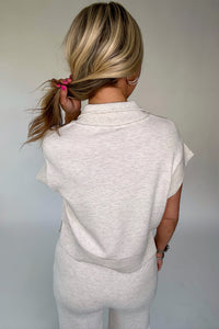 Ensemble femme écru : haut polo manches courtes et pantalon large, vue de dos