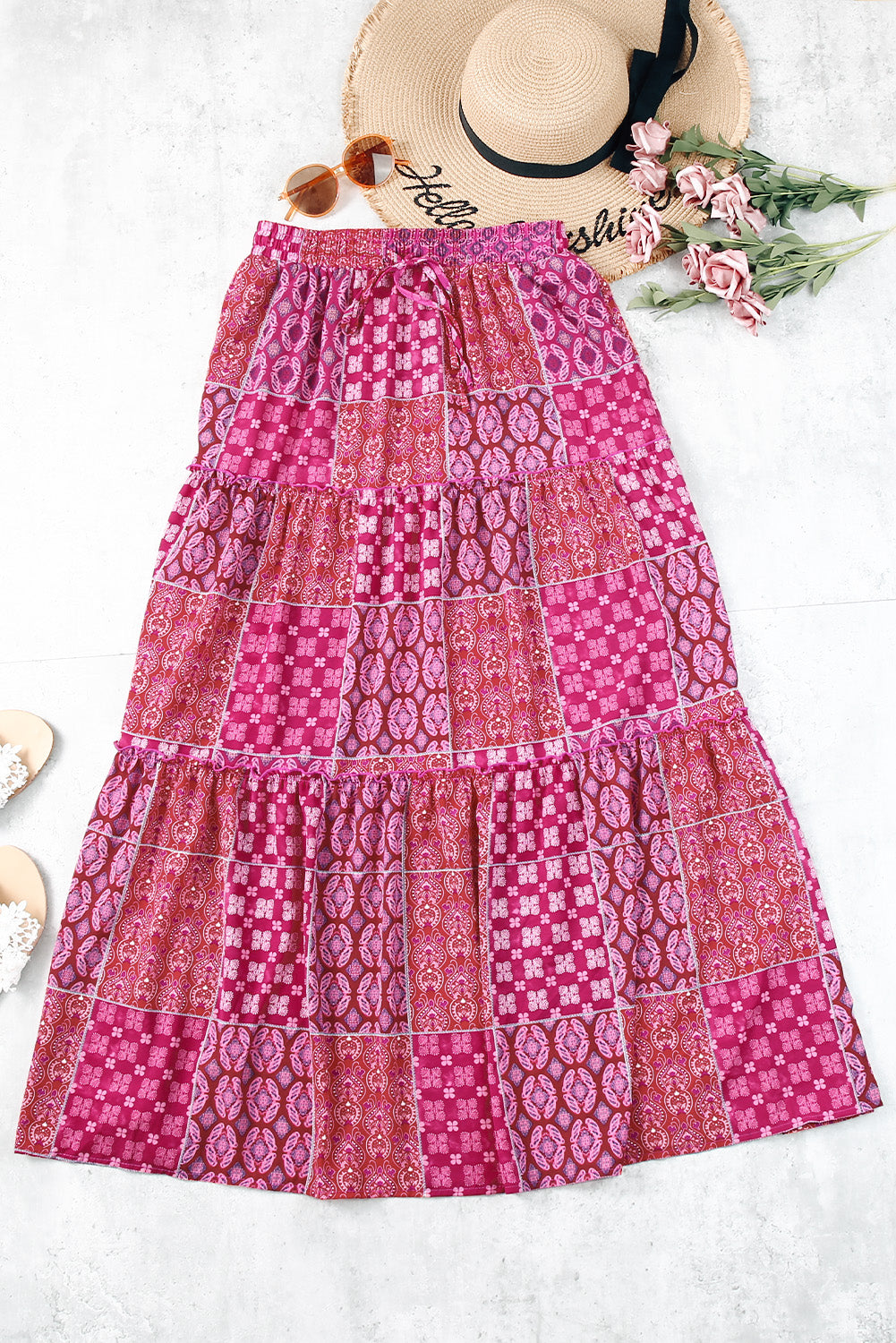Jupe longue rose fuchsia à volants, motif cachemire, coupe évasée