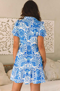 Mini robe femme motifs floraux bleu ciel, dos dégagé et manches bouffantes