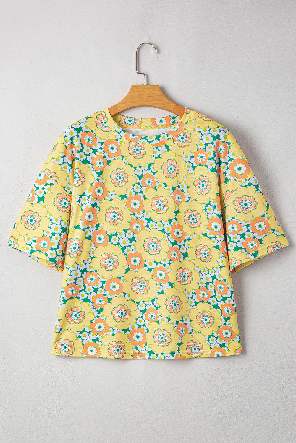 T-shirt ample jaune à fleurs, manches chauve-souris, col rond, coupe ample