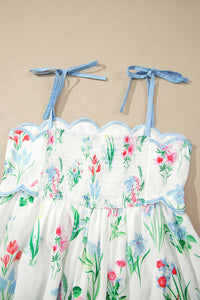 Buste froncé de robe à bretelles nouées, bordure bleu clair, imprimé floral