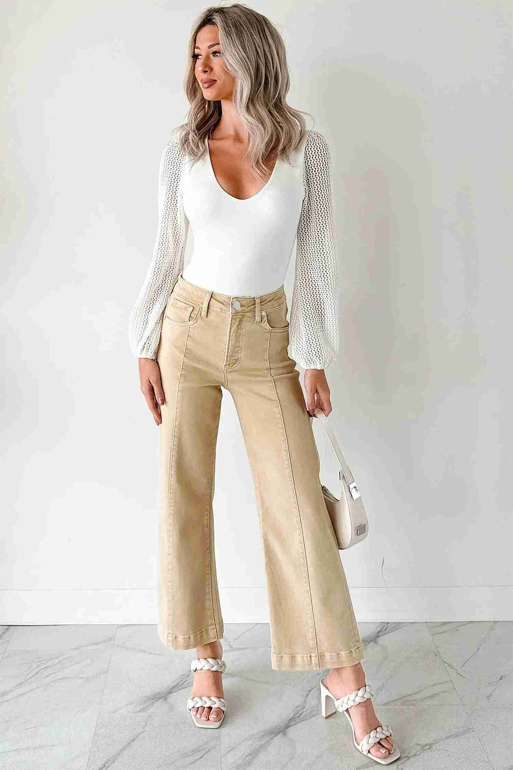 Jean femme évasé abricot, coupe large, surpiqûres sur la jambe