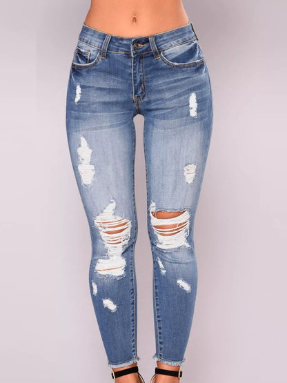 Jean moulant femme en denim délavé à effet usé – vue 5