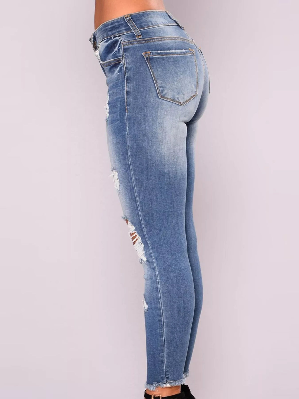 Jean moulant femme en denim délavé à effet usé – vue 6