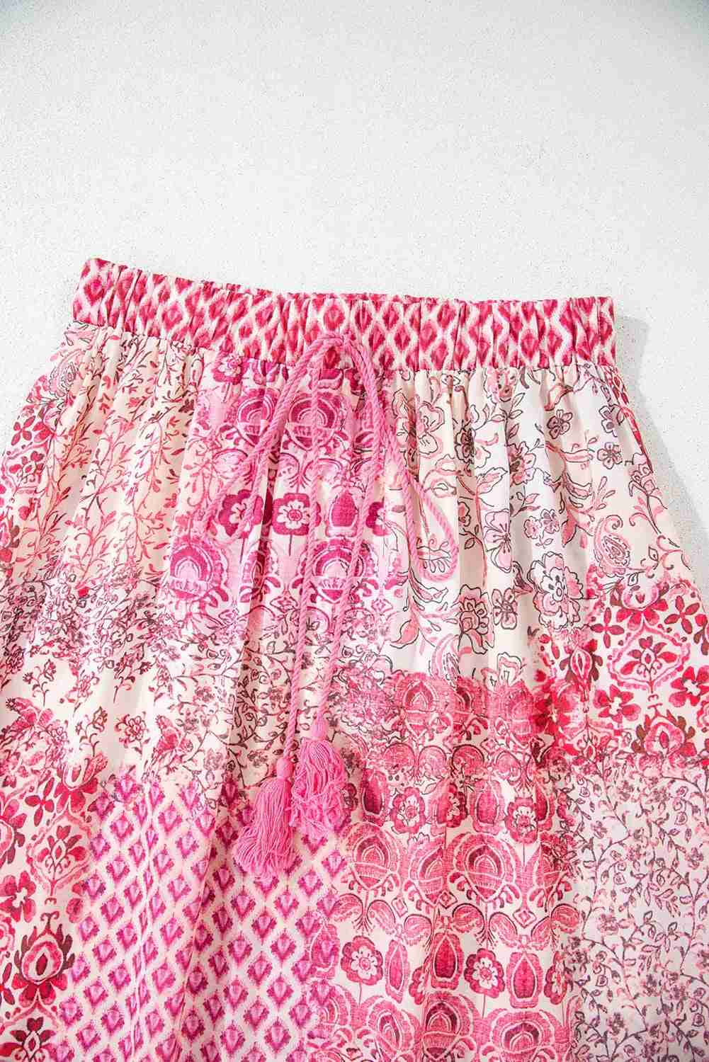 Jupe longue bohème rouge rosé, taille élastique froncée et motifs cachemire