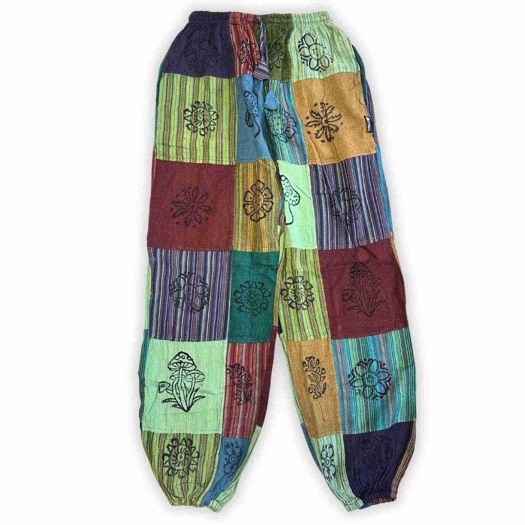 Pantalon patchwork multicolore à motifs de champignons, jambes larges, taille élastique.