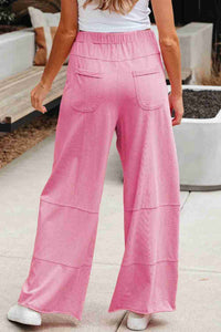 Pantalon cargo femme rose bonbon à jambes larges, taille élastique, poches plaquées