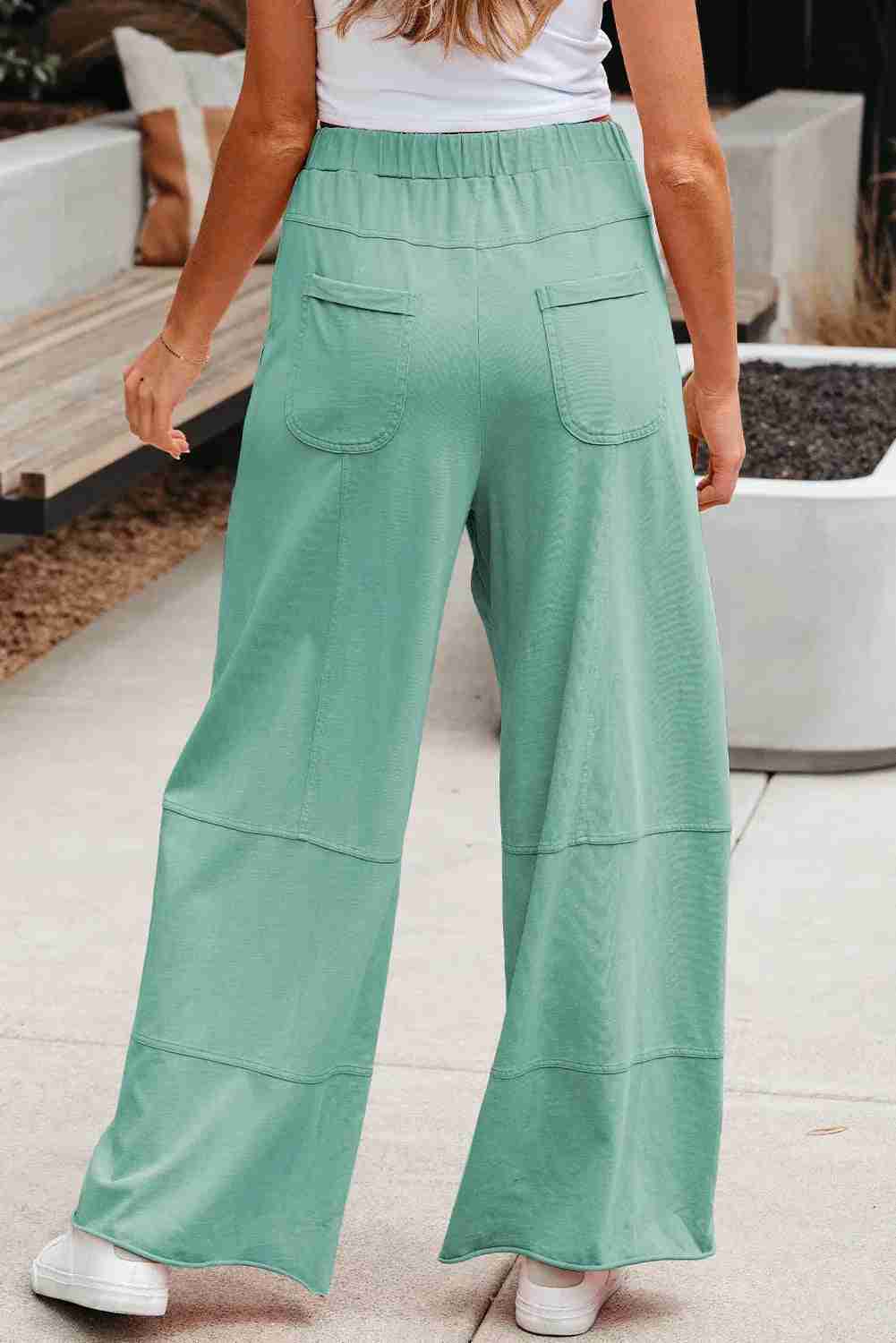 Pantalon cargo femme vert menthe à jambes larges, taille élastique, poches plaquées
