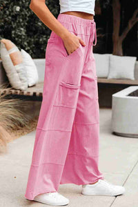 Pantalon cargo femme rose bonbon, taille élastique à cordon, poches sur les jambes