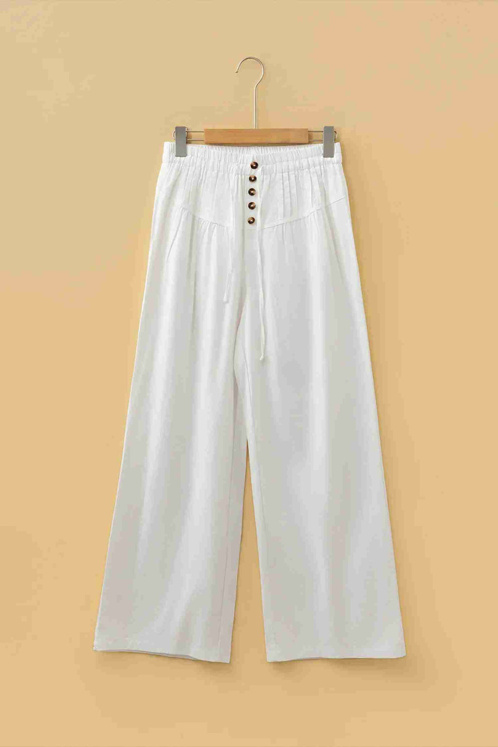 Pantalon large femme écru, ceinture élastique avec cordon et boutons sur le devant