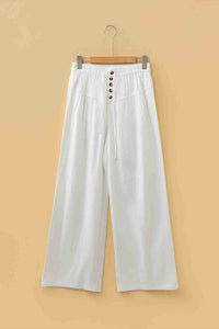Pantalon large femme écru, ceinture élastique avec cordon et boutons sur le devant
