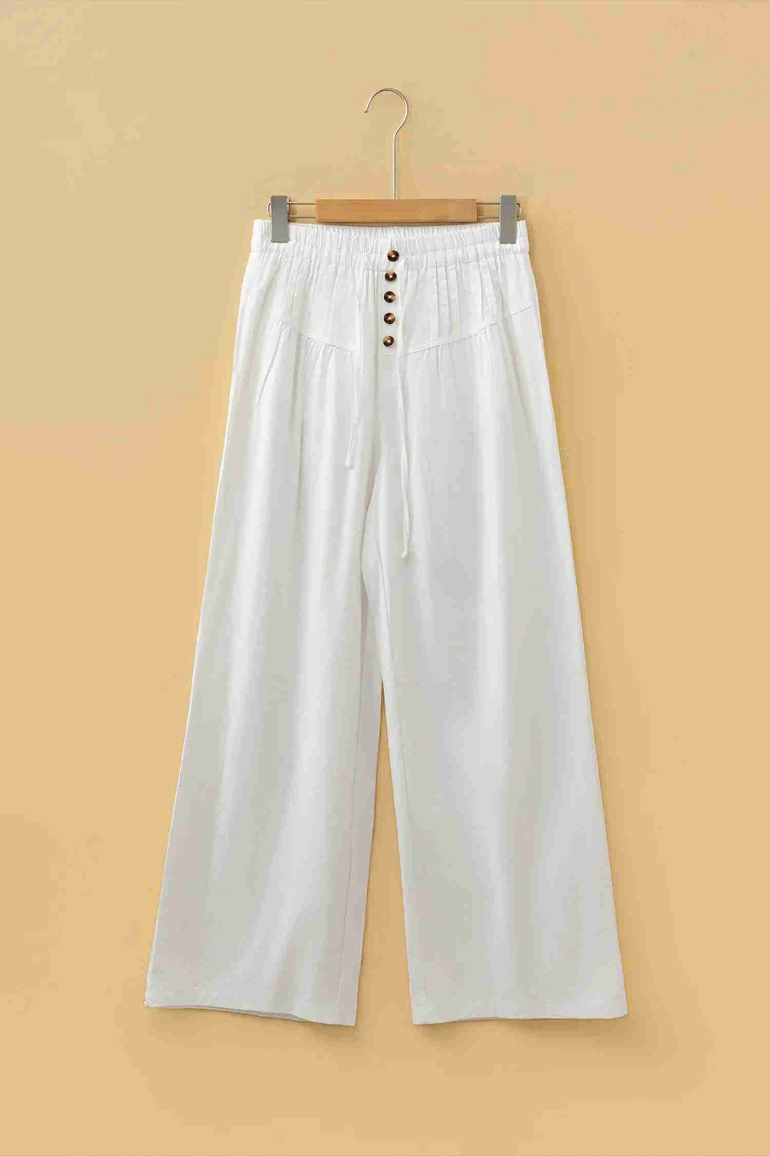Pantalon large femme écru, ceinture élastique avec cordon et boutons sur le devant