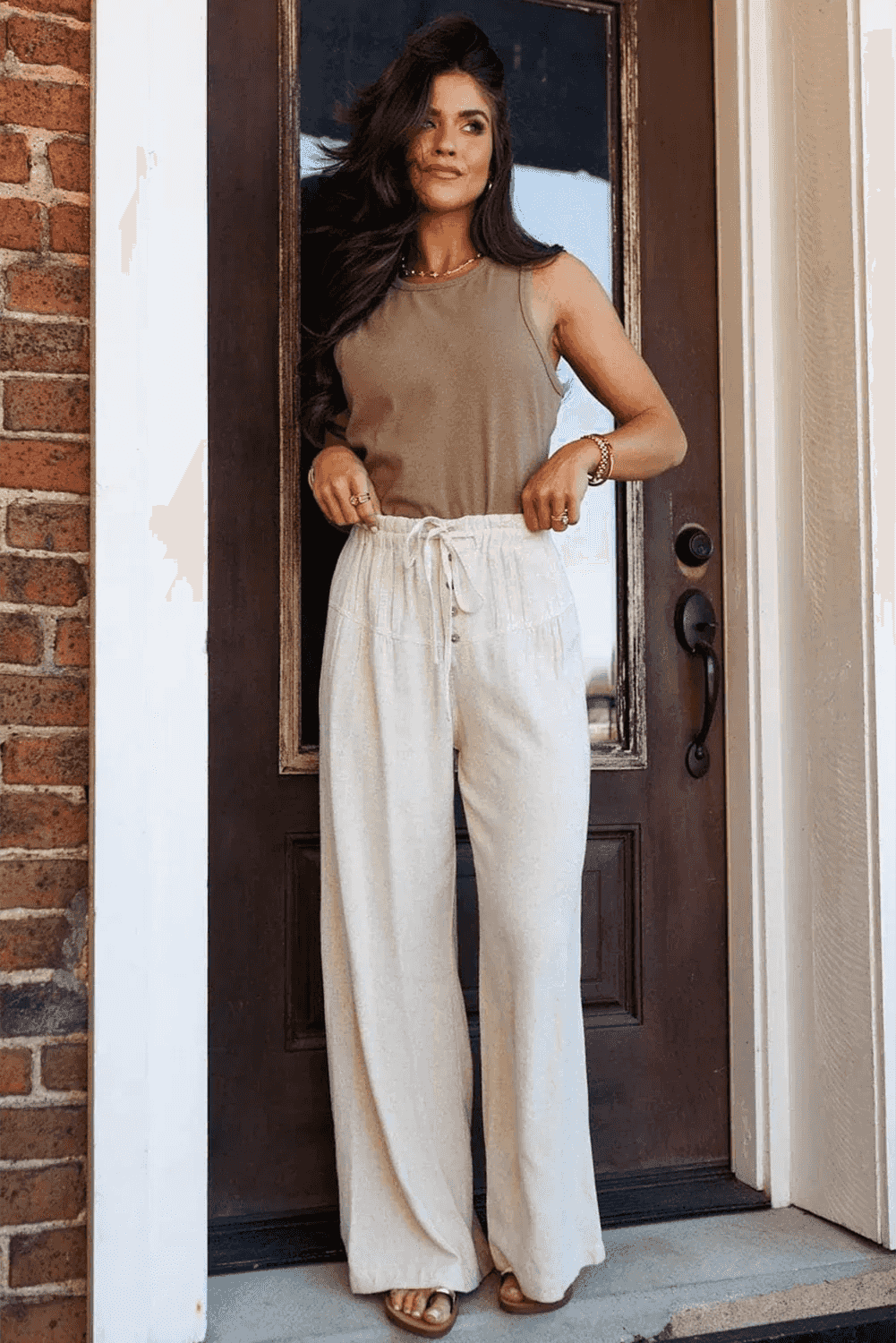 Pantalon large femme écru à taille élastique et lien, patte boutonnée sur le devant