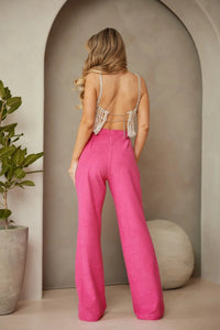 Pantalon fuchsia taille haute en tissu terry structuré, vue de dos.