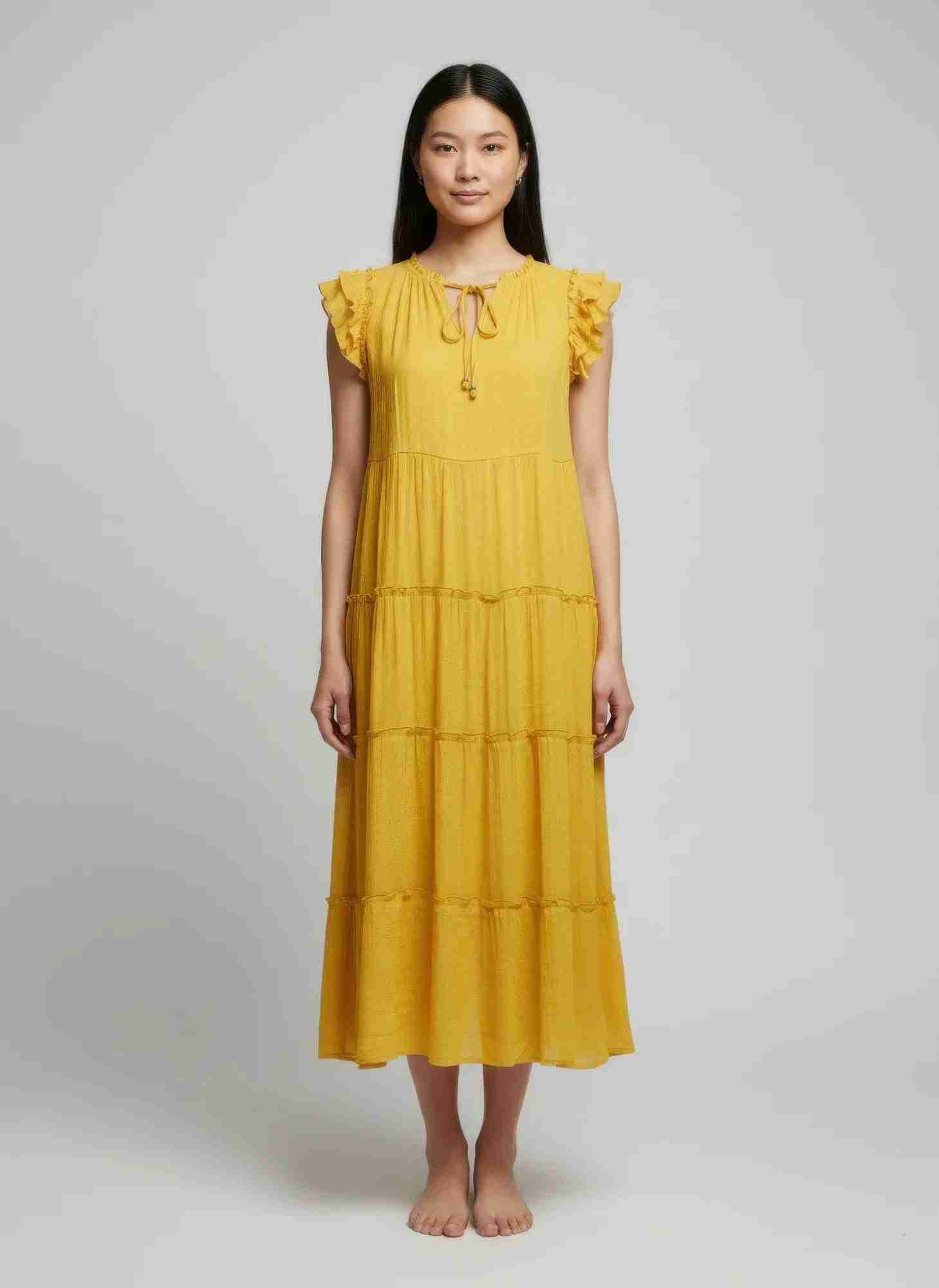 Robe jaune mi-longue à volants aux épaules, encolure à cordon, tissu léger