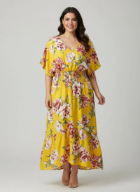 Robe fleurie moutarde à manches courtes évasées, taille élastique, ourlet asymétrique