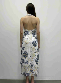 Robe sans manches à motif floral, dos découvert, ourlet asymétrique.