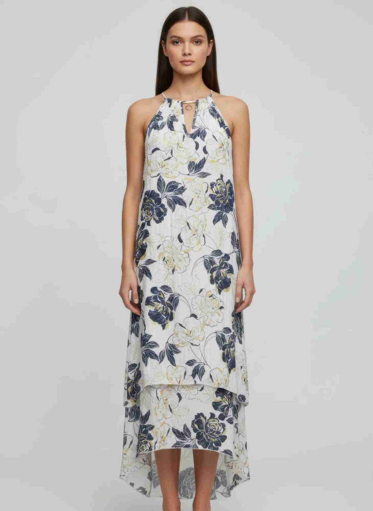 Robe sans manches à motif floral, ourlet asymétrique et détail col volant.