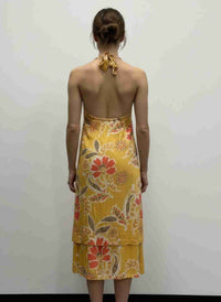 Robe sans manches moutarde à motif floral, dos et col au détail volant.