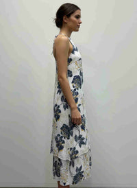 Robe sans manches à motif floral, ourlet asymétrique, vue de profil.