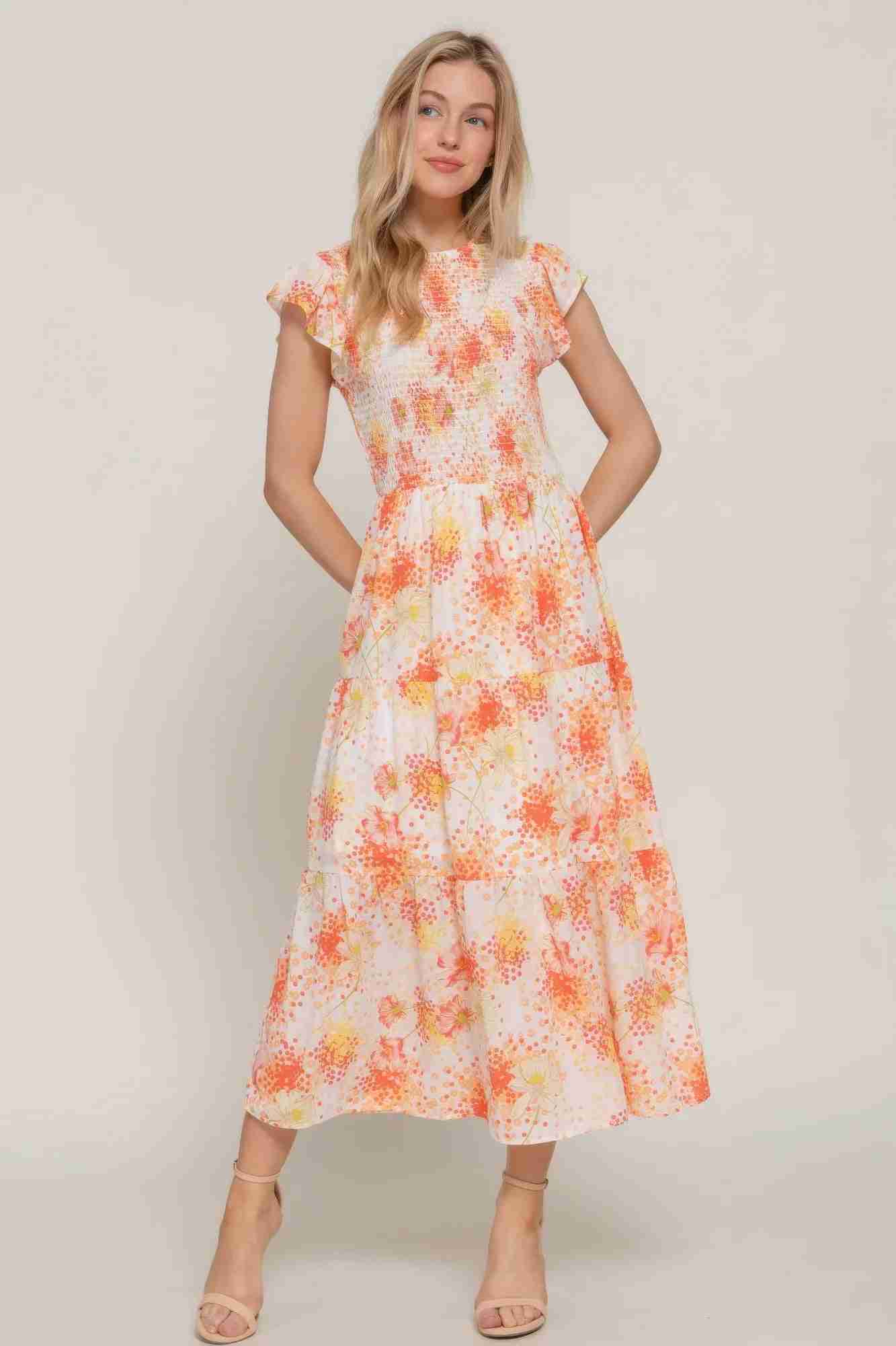 Robe florale smockée ivoire à manches à volants, motifs orange