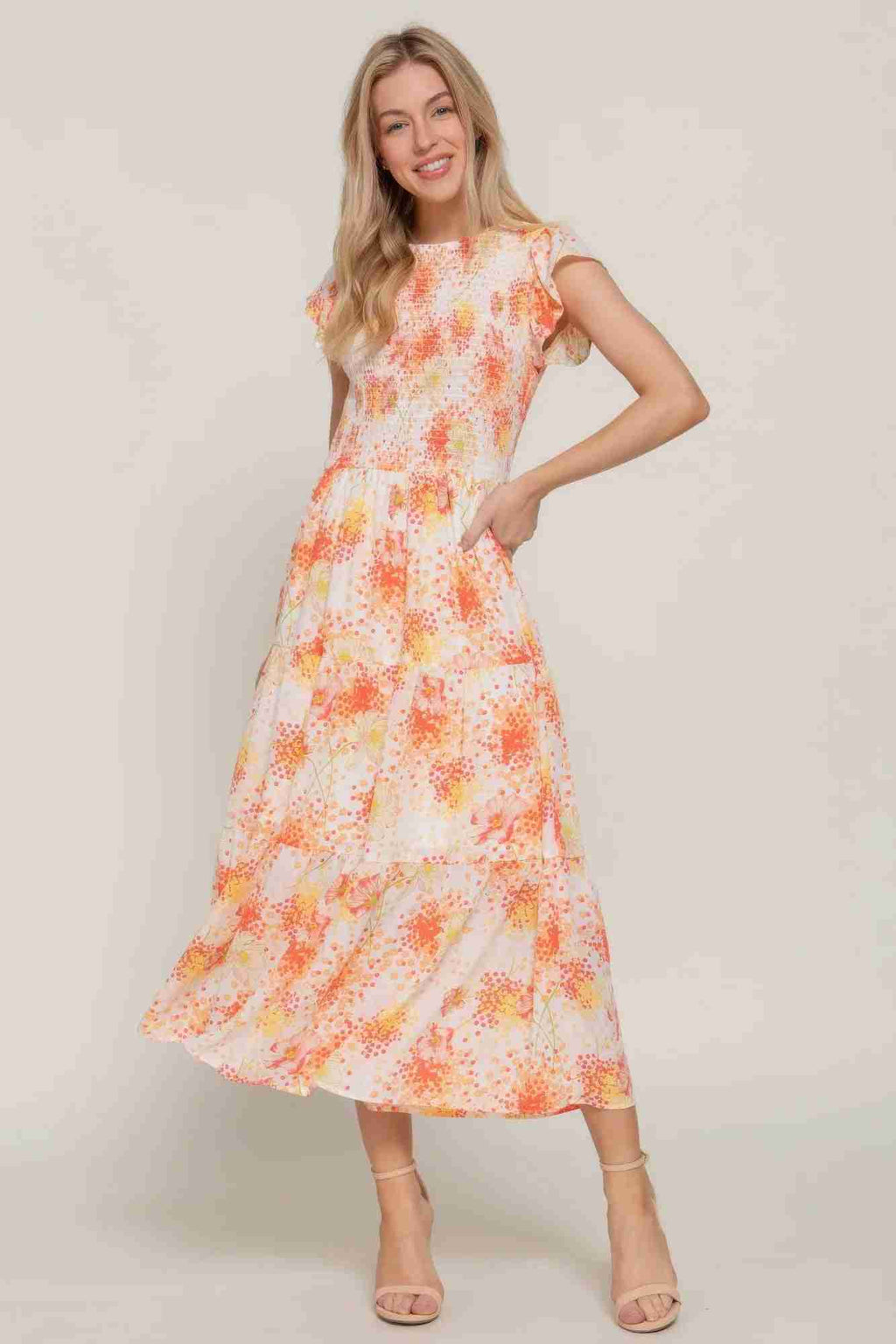 Robe florale smockée ivoire à manches à volants et motifs orangés